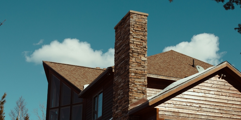 Old chimney on roof of house