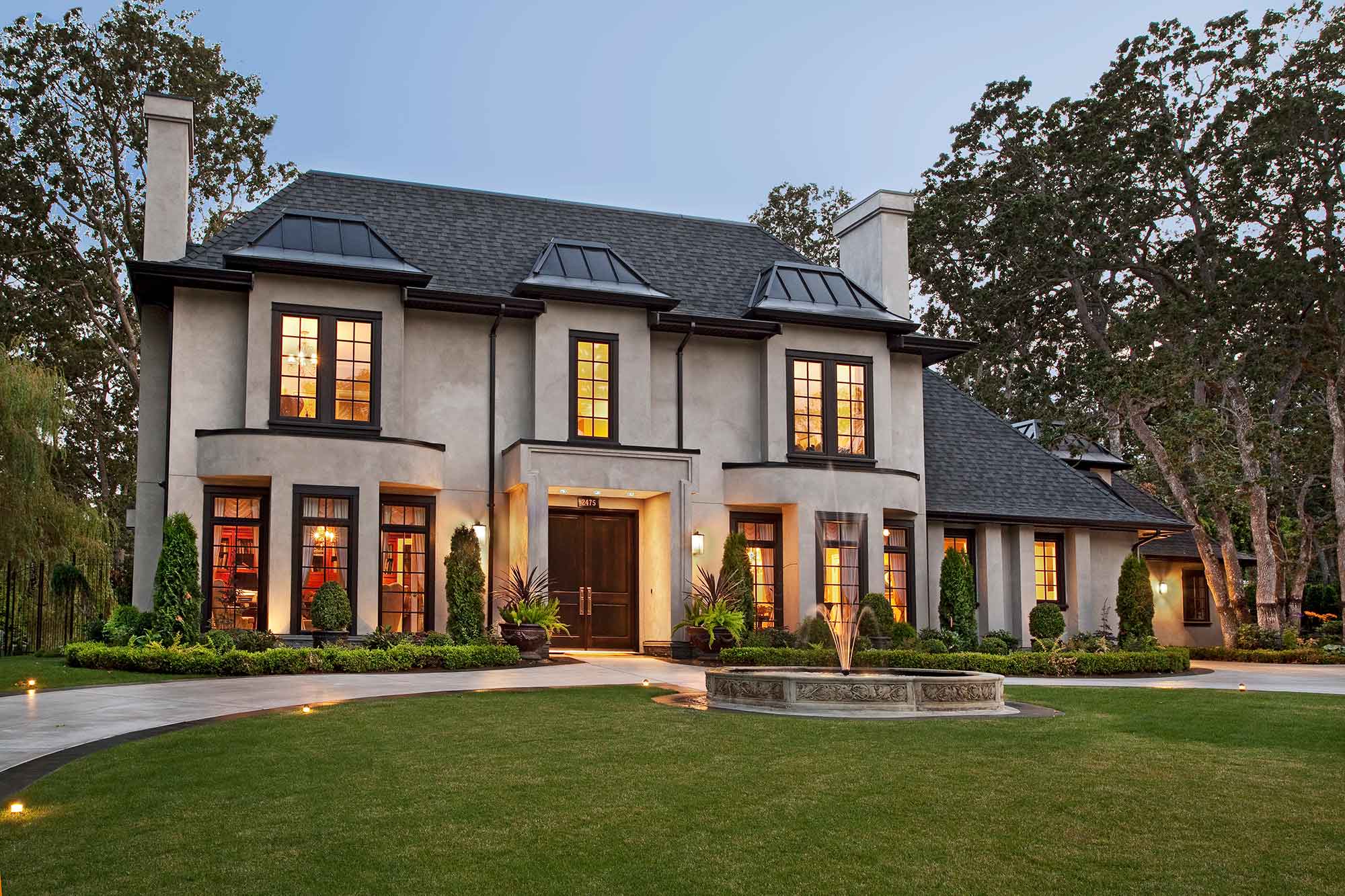 elegant home with green grass