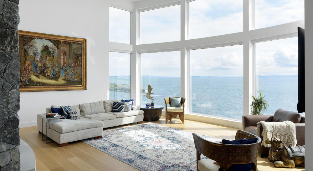 living room with ocean views and big windows